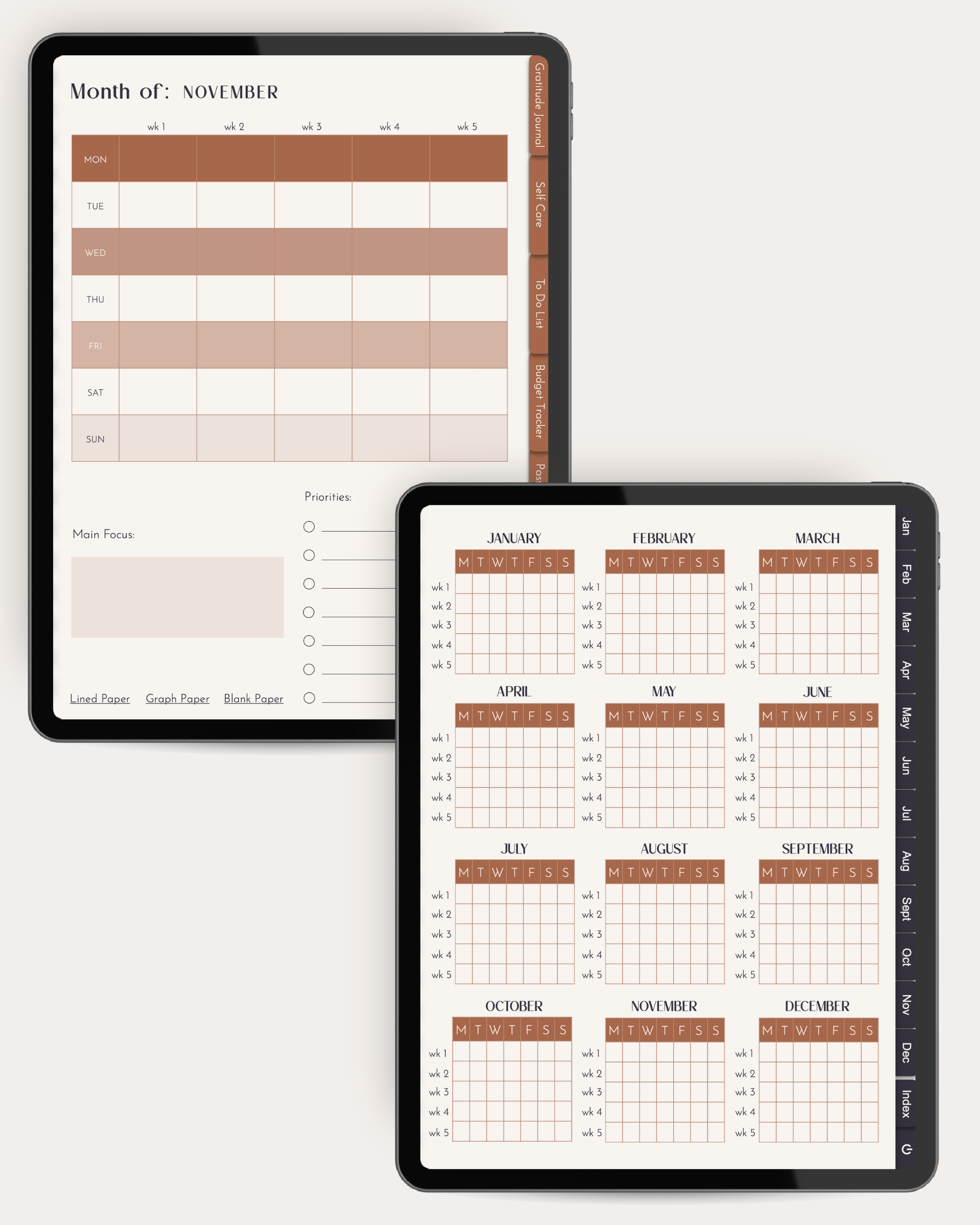 Two tablets displaying calendar and planner interfaces on a white background