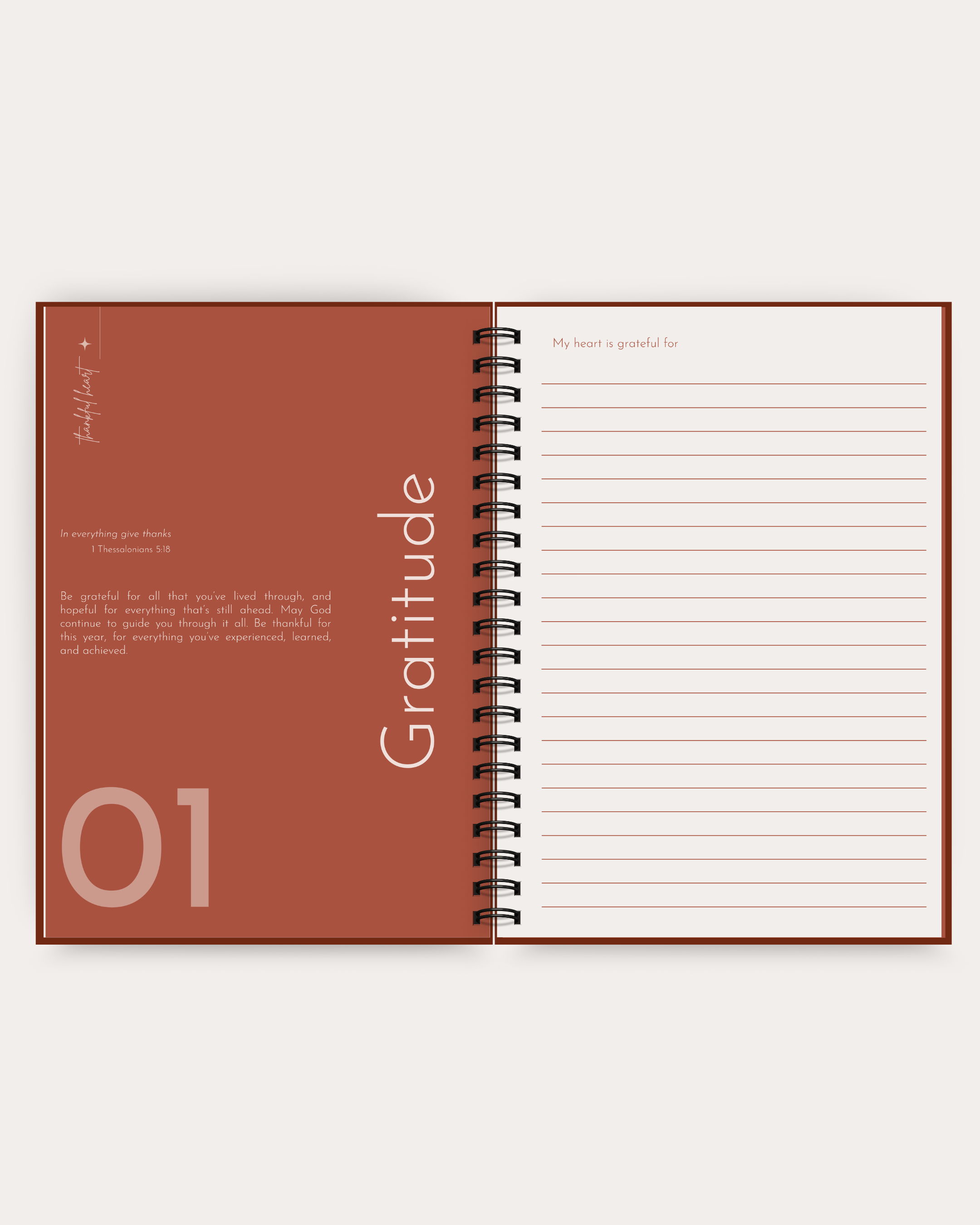 Open spiral-bound notebook with 'Gratitude' section on a white background