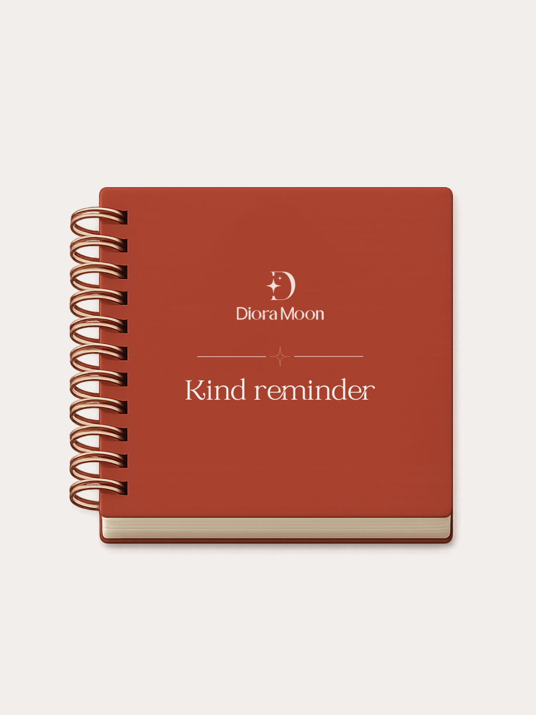 Terracotta notebook with 'Diora Moon' logo and 'Kind reminder' text on a white background
